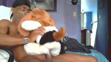 Ebony guy fucks stuffed teddy