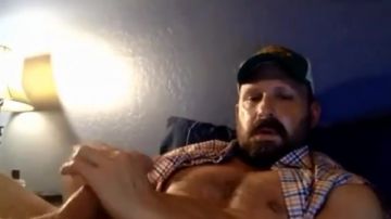 Bearded daddy jerks off in front of cam