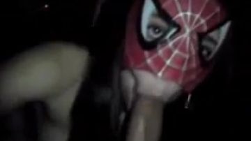 Spider girl blows fat cock
